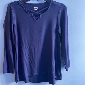 A navy blue long sleeve shirt